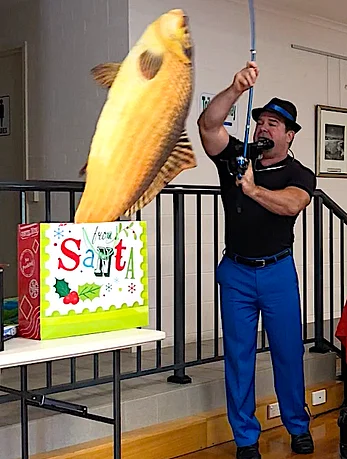 Glenn Keeley fishing for laughs with his kids magic shows